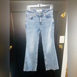 Hollister Woman’s Mid Rise Relaxed Bootcut Light-Wash Raw Hem Denim Jeans